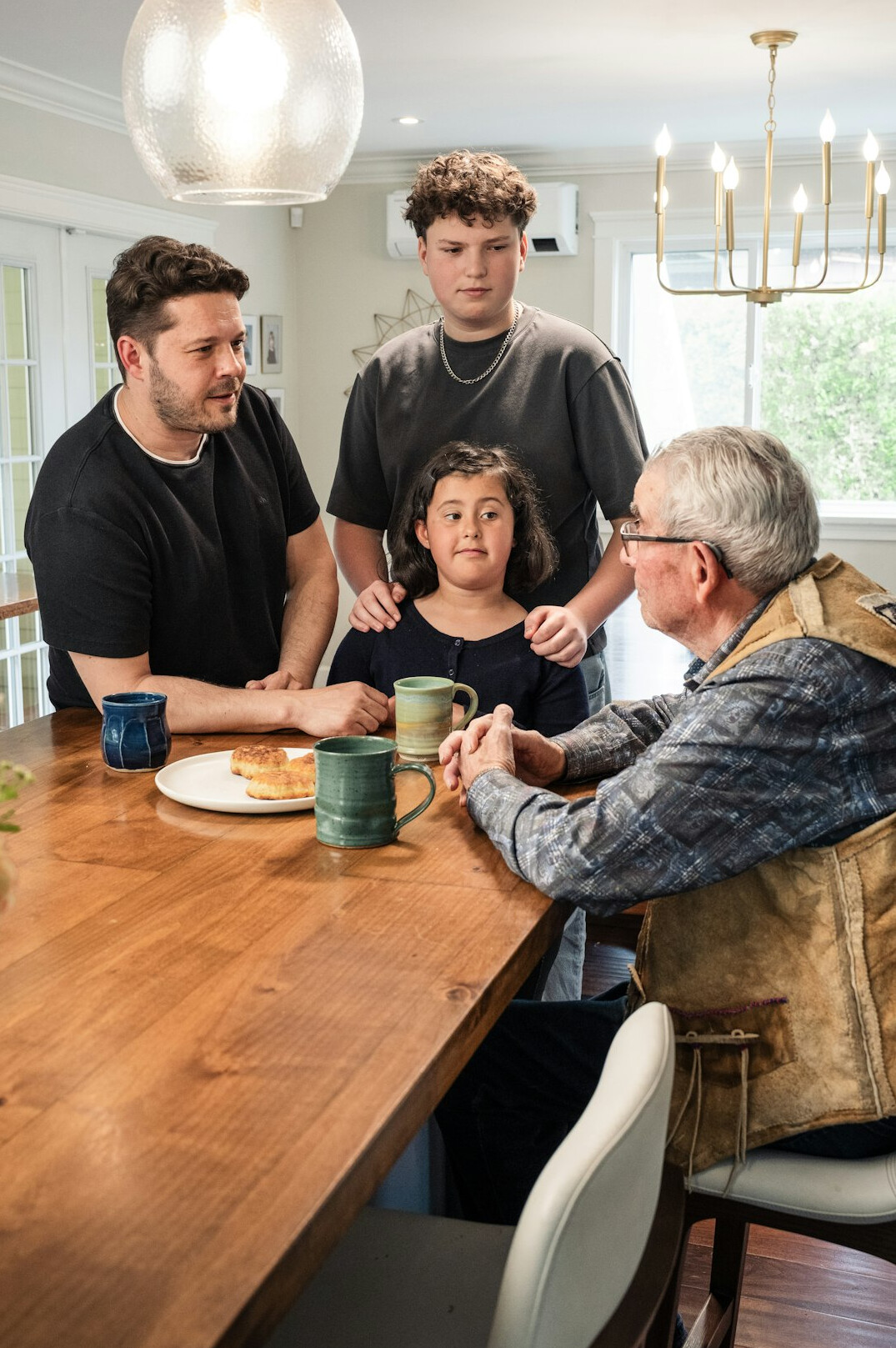 Team of professionals discussing around a table