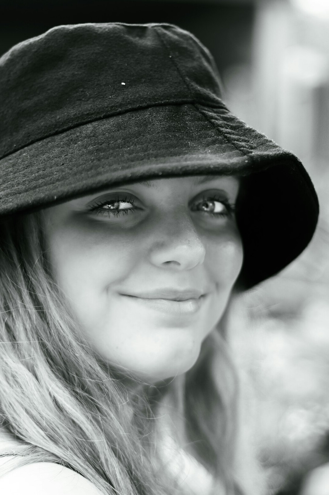 Portrait of a young woman with a warm smile